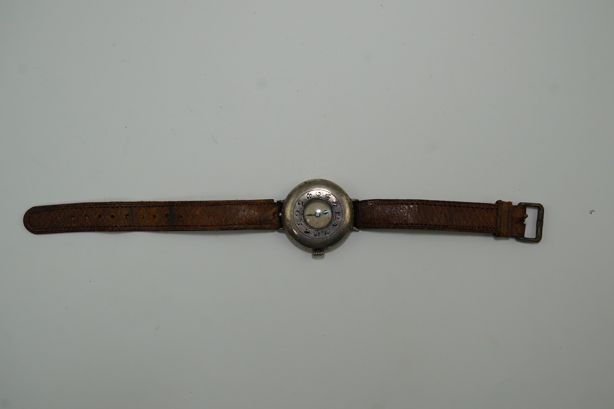 A gentleman's mid 1920's silver Rolex half hunter manual wind wrist watch